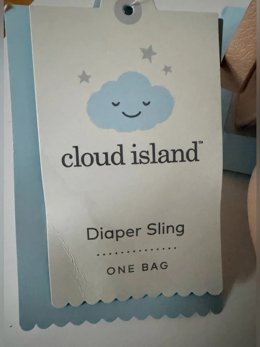 Cloud Island diaper sling in tan with checkered strap